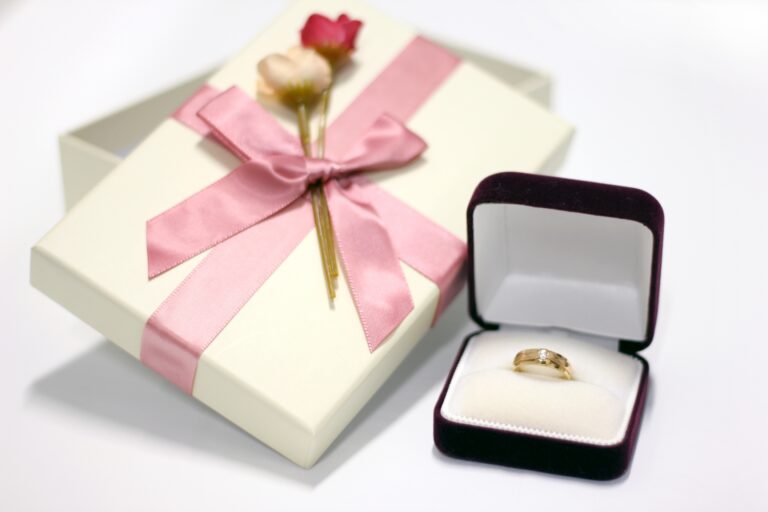 Gift,Box,With,Pink,Ribbon,Decoration,,Gold,Ring,And,Case